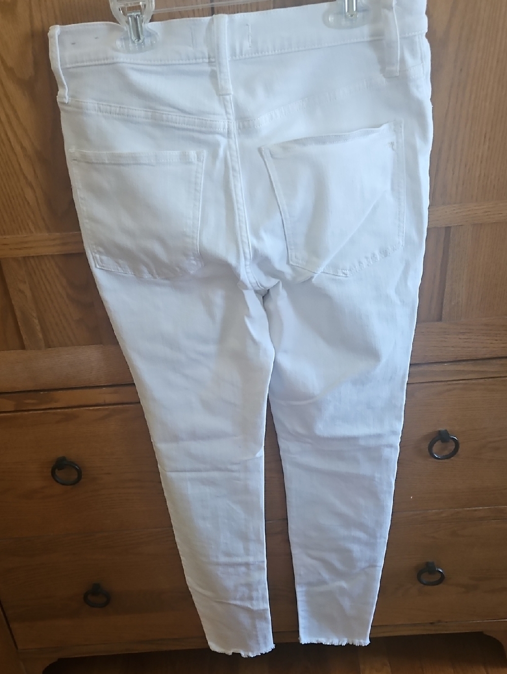 Mid -Rise White Button-Front Skinny Jeans - Picture 4 of 8